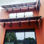 Solar panels on Des Moines Sherman Hill building being renovated and designed by Indigo Dawn and Silent Rivers