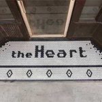 theHeart-green-and-main-entrance-historic-building-Sherman-Hill-renovated-by-Silent-Rivers